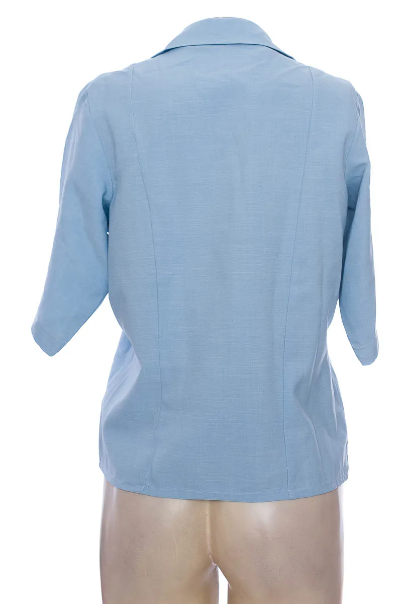 BLUSA COLOR AZUL  CLOSEANDO