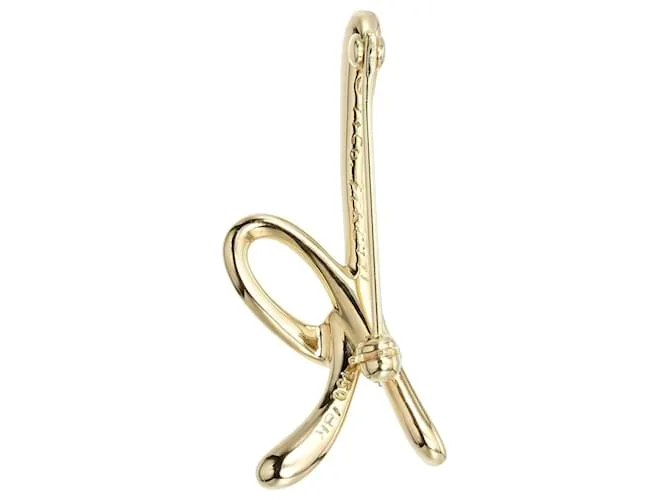 Broche de oro amarillo de 18K con la inicial K de Tiffany & Co. 
