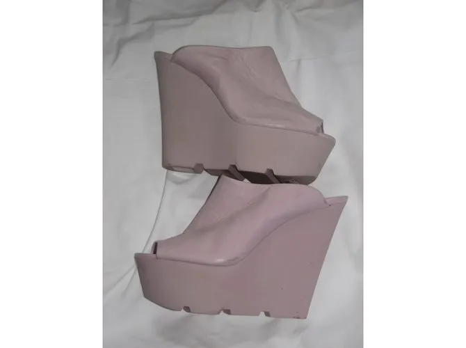 Kurt Geiger Mulas de cuña Rosa 