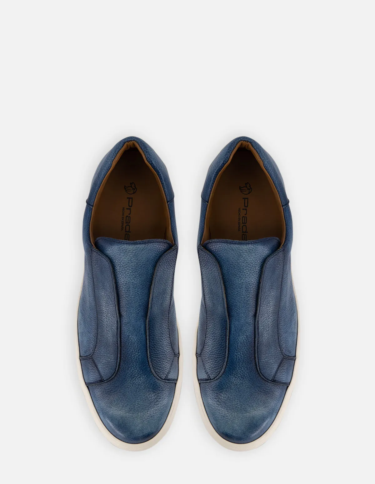 Tenis slip on en piel color azul para hombre