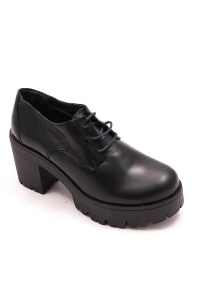 zapato is to me tacón negro