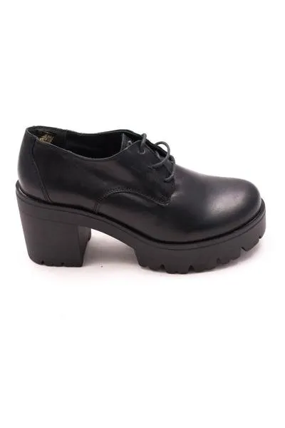 zapato is to me tacón negro